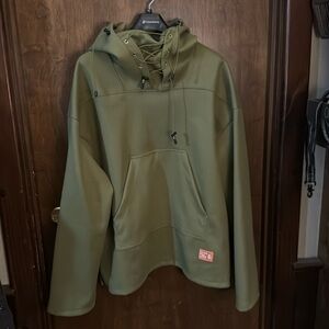 Hooded green pull over laced up front size xxl in brand new condition